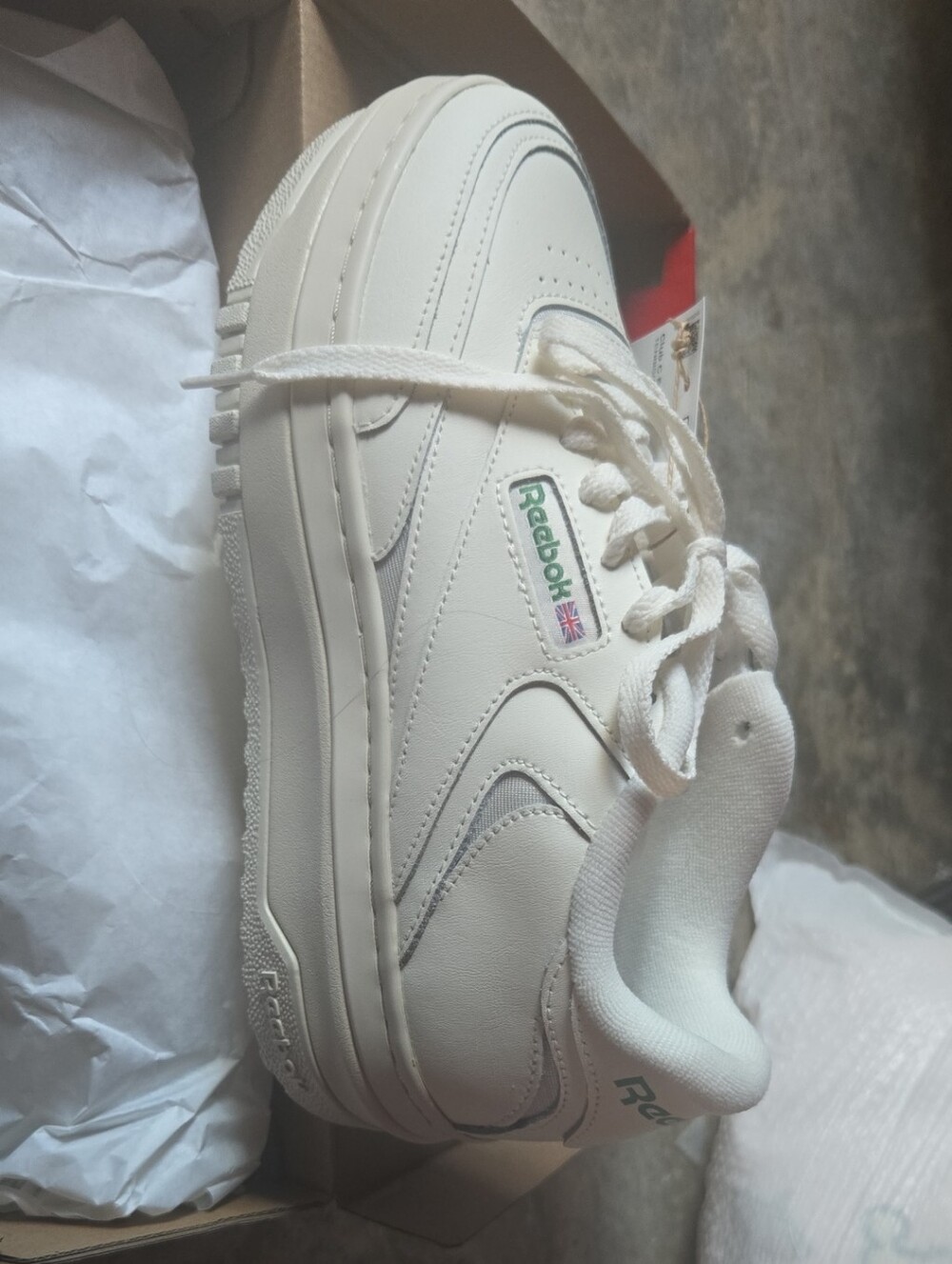 Reebok White Low-Top Leather Athletic Sneaker with Green Logo